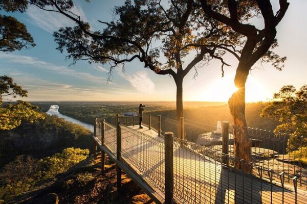 Blue Mountains, Sydney, Australia sunset view with Three Sisters at Echo Point overlooking Jamison Valley and natural landscape in New South Wales